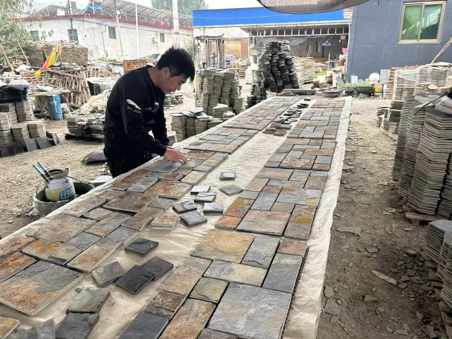 Crazy paving flagstone detail, riven split face texture and mesh bond close-up