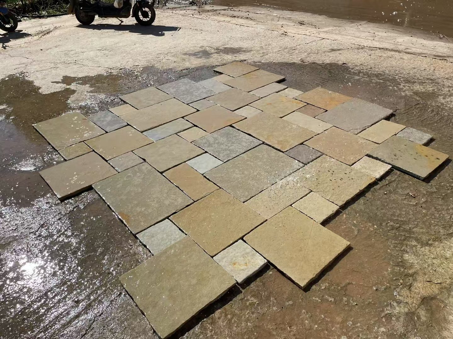 Crazy paving flagstone detail, riven split face texture and mesh bond close-up