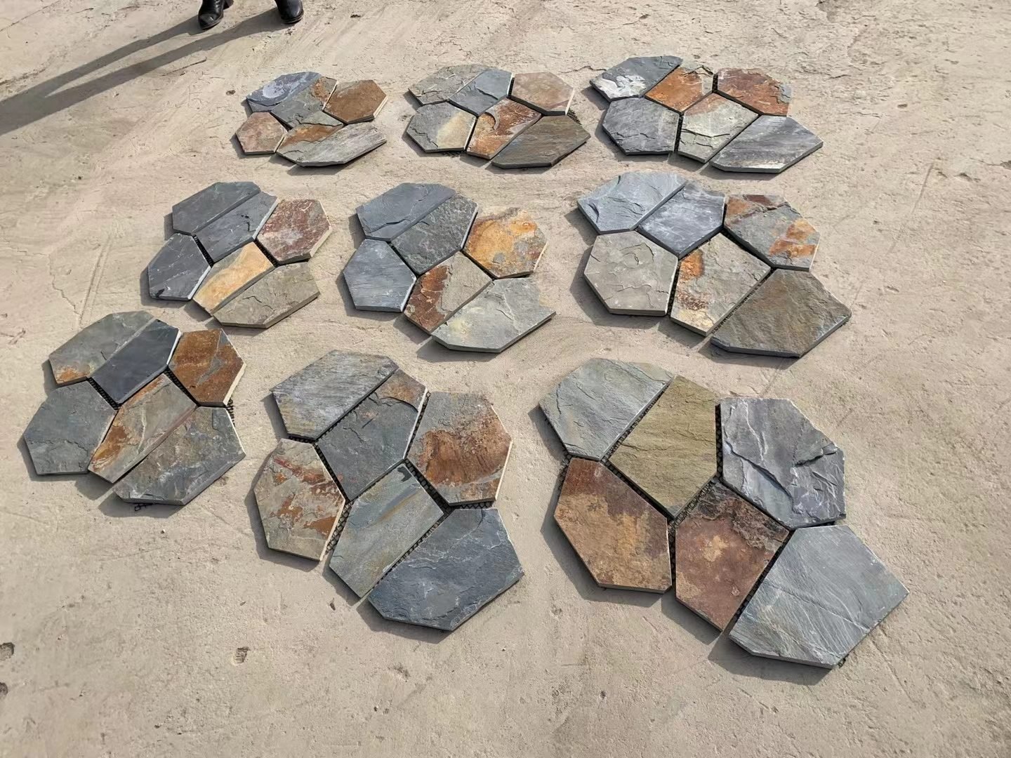 Cut crazy paving flagstone pieces sorted and ready for mesh backing assembly
