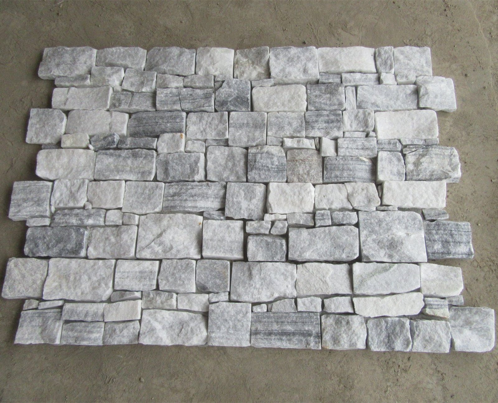 Interlocking z panel colorway, cement backed stone cladding 20x55cm for seamless commercial facades