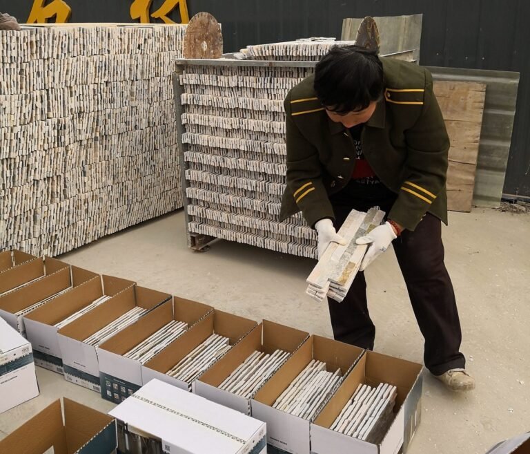quality control and packing of stacked stone veneer into cartons - factory direct natural stone cladding manufacturer with infrared cutting machine, CNC diamond cutting and hand-laid stone panels,...