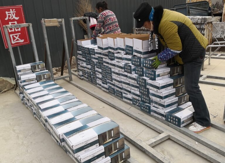 quality control and packing of stacked stone veneer into cartons - factory direct natural stone cladding manufacturer with infrared cutting machine, CNC diamond cutting and hand-laid stone panels,...