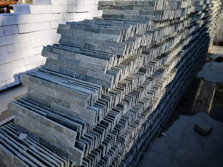 rotia grey mini ledgestone stacked stone 10x36cm details - close-up texture of ultra thin stone veneer, mini ledgestone detail for european architectural cladding, modern linear design - photo 1