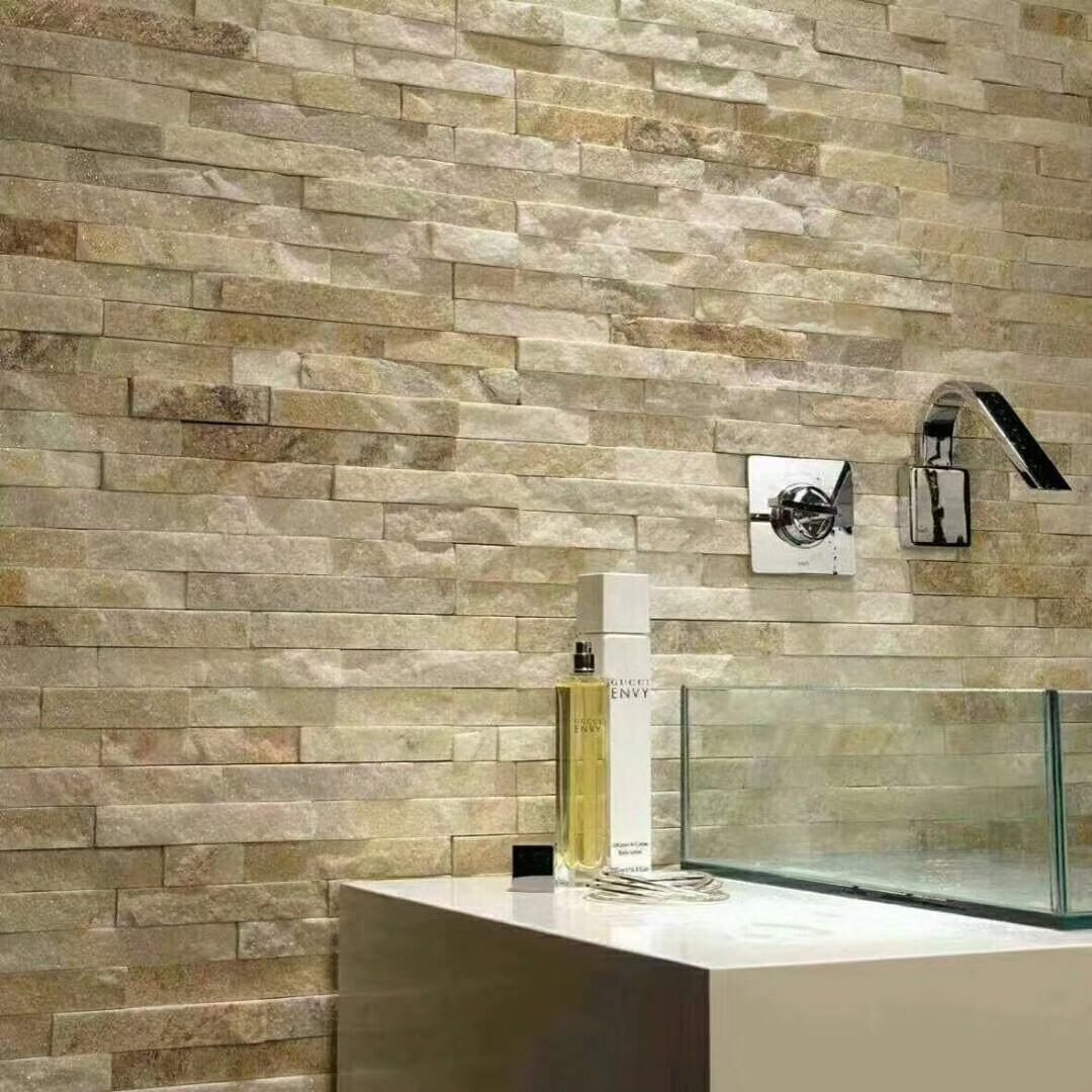 Villa exterior wall clad in natural stacked stone cladding