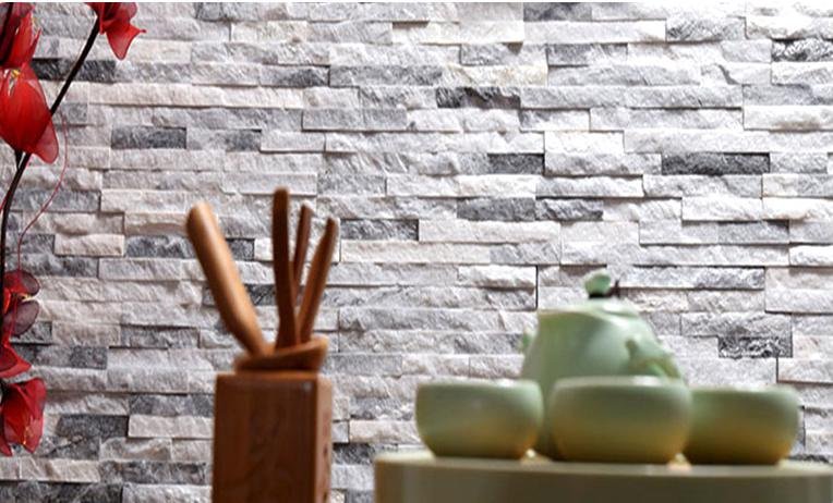 stone fireplace hearth design - outdoor natural stone cladding scene, weathering the elements for an outdoor fireplace and seat wall program