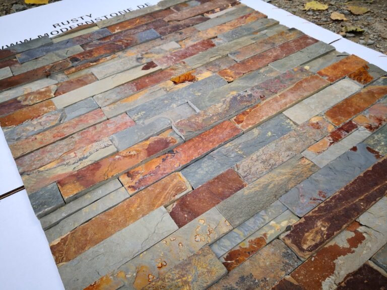 stacked stone details - close-up split face texture of natural stone ledger veneer panels, hand-split quartzite and slate surface detail for exterior wall cladding - photo 1