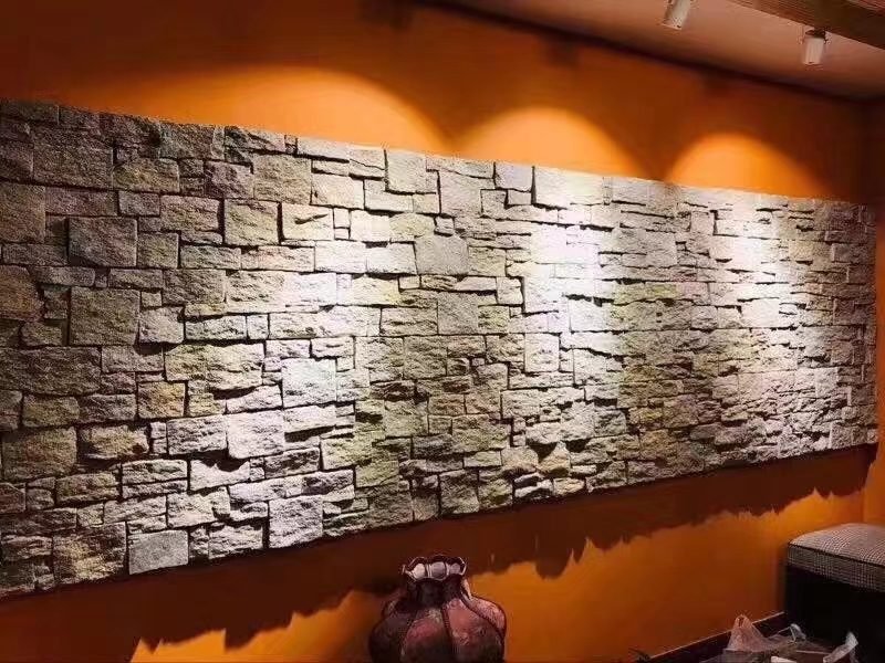 High-rise exterior stone cladding with mechanical anchors for cold climates