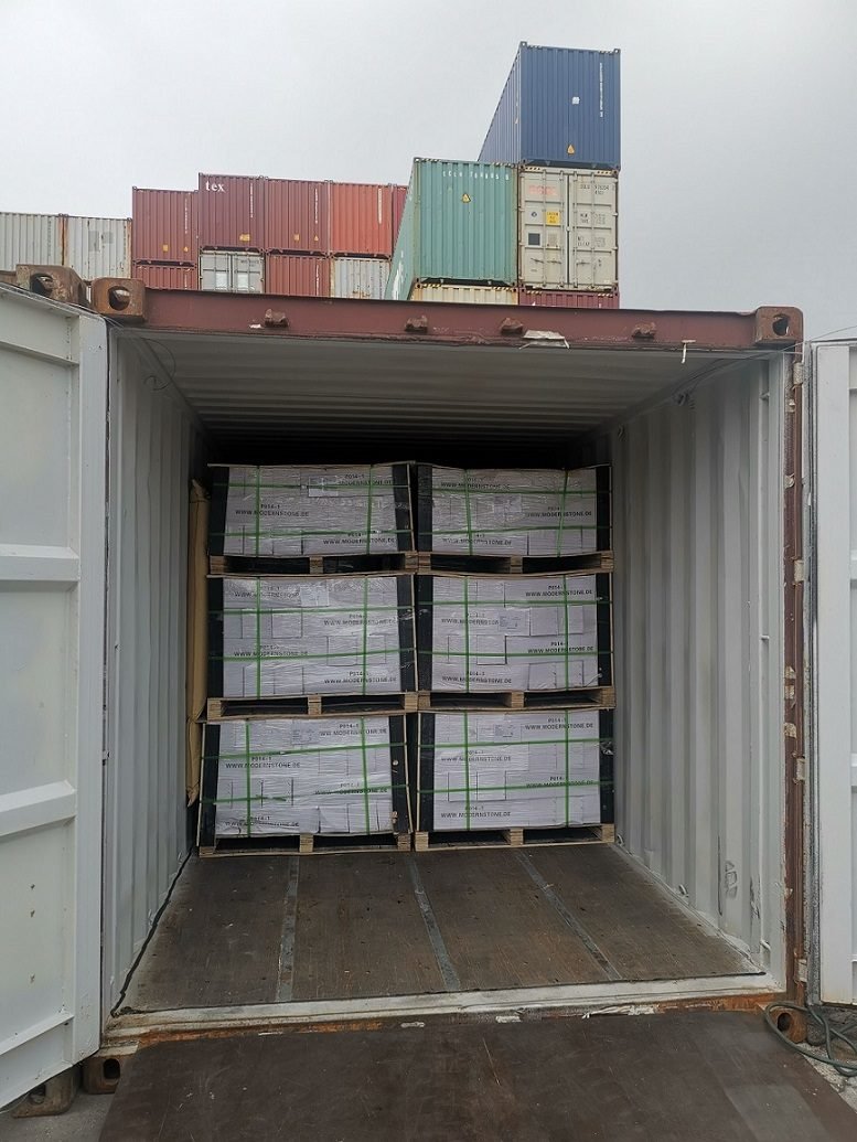 stone cladding contractor insurance material claim - stone panels packed in plywood pallets for container shipping, cargo protection and delivery condition documentation