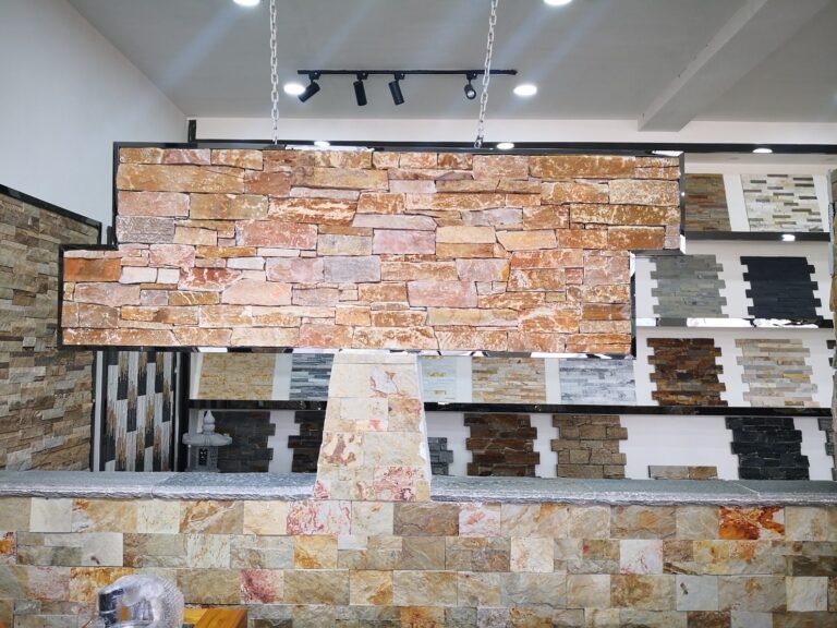 top stone panels natural stone cladding wall display - Top Stone Panels factory showroom display with stacked stone, ledgestone and stone cladding samples for wholesale buyers - photo 1