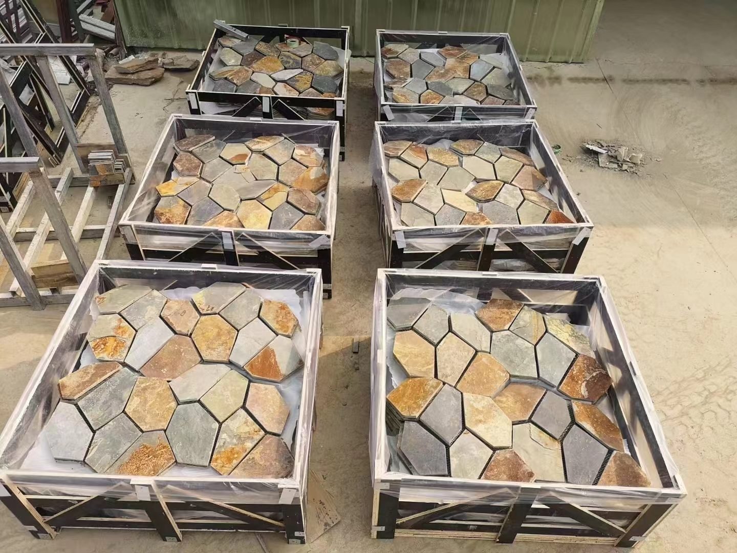 Well-packed flagstone and crazy paving products secured on export pallets