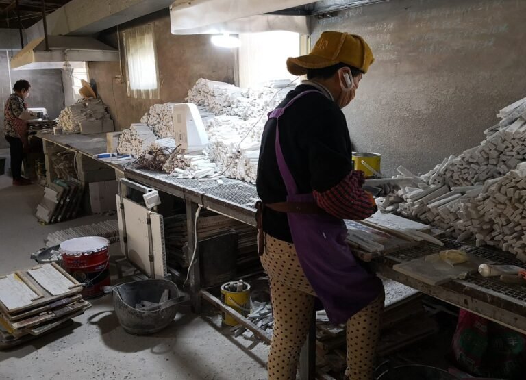 workers hand assembling natural stone split face panels - factory direct natural stone cladding manufacturer with infrared cutting machine, CNC diamond cutting and hand-laid stone panels, 18 years...