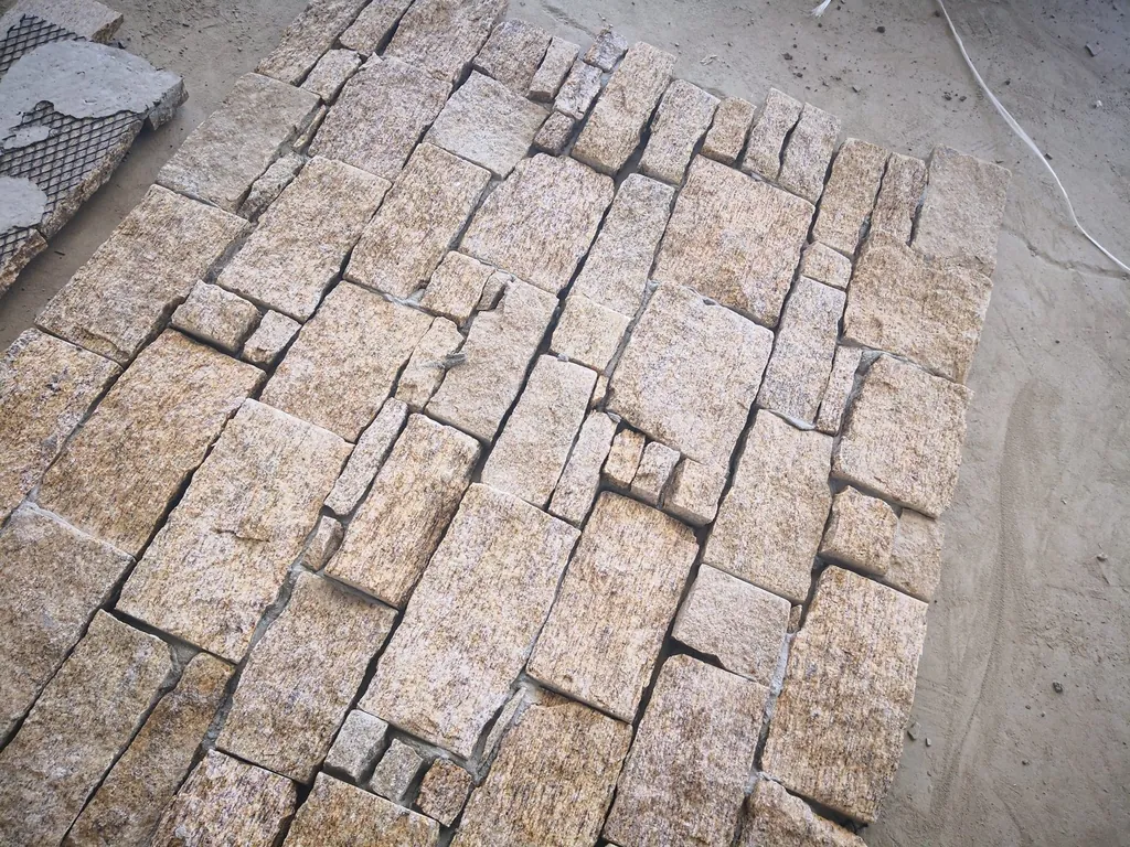 TSP-123 interlocking z panel detail, male-female connection edge and split face texture close-up