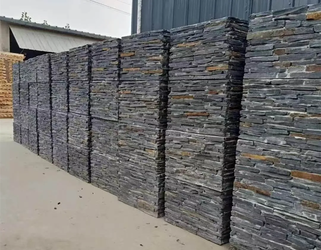 stone column wrap - finished stacked stone gate column with stone cap over the wrapped faces